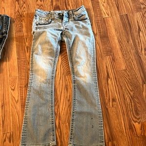 Miss me jeans size 27. Cross and wings on back pocket